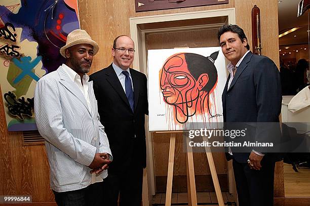 Artist Doze Green, HSH Prince Albert II of Monaco and artist Toxic attend Graffiti Au Yacht Club De Monaco, paint exhibition, on May 19, 2010 in...