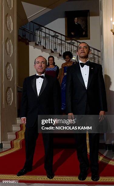 President Barack Obama, his wife Michelle Obama, Mexican President Felipe Calderon and his wife Margarita Zavala arrive at the White House before a...