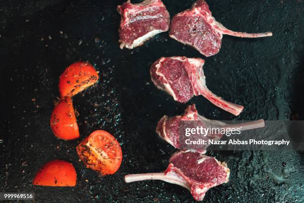 lamb cutlet being prepared. - nazar stock-fotos und bilder