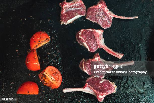lamb cutlet being prepared. - auckland region stock pictures, royalty-free photos & images