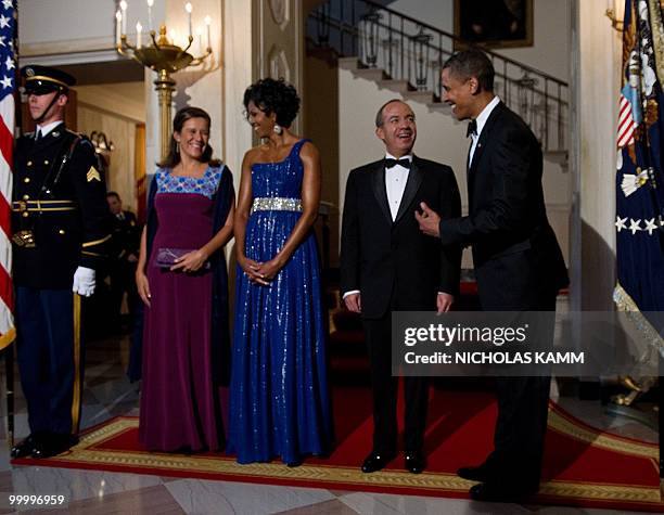 President Barack Obama, his wife Michelle Obama, Mexican President Felipe Calderon and his wife Margarita Zavala arrive to pose for pictures at the...