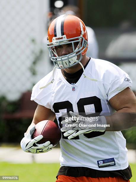 Running back Peyton Hillis of the Cleveland Browns carries the ball during the team's organized team activity on May 19, 2010 at the Cleveland Browns...