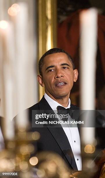 President Barack Obama addresses the state dinner for Mexican counterpart Felipe Calderon at the White House in Washington on May 19, 2010. AFP...