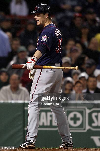 Justin Morneau of the Minnesota Twins argues the call that he struck out in the fourth inning against the Boston Red Sox on May 19, 2010 at Fenway...