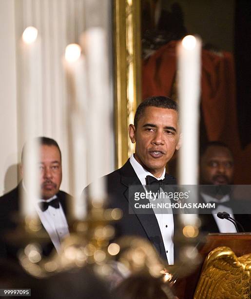 President Barack Obama addresses the state dinner for Mexican counterpart Felipe Calderon at the White House in Washington on May 19, 2010. AFP...