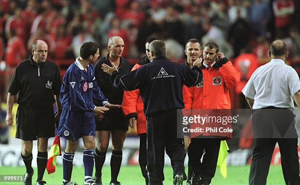 Leicester City manager Peter Taylor confronts Referee Mike Dean at half time during the FA Barclaycard Premiership match between Charlton Athletic...