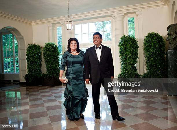 Comedian George Lopez and Ann M. Lopez arrive at the White House for a state dinner May 19, 2010 in Washington, DC. President Barack Obama and first...