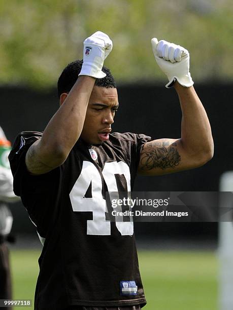 Defensive back Joe Haden of the Cleveland Browns stretches during the team's organized team activity on May 19, 2010 at the Cleveland Browns practice...