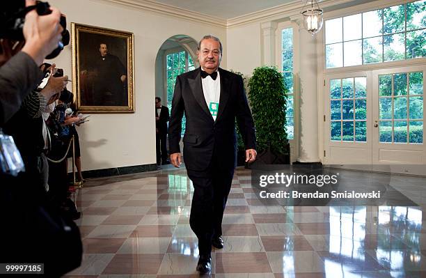 Carlos Slim, Chairman and CEO of Telmex, Telcel and America Movil, arrives at the White House for a state dinner May 19, 2010 in Washington, DC....