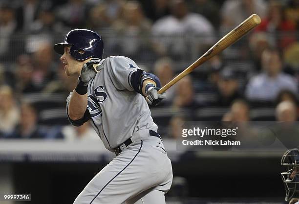 Evan Longoria of the Tampa Bay Rays hits an RBI single against the New York Yankees at Yankee Stadium on May 19, 2010 in the Bronx borough of New...