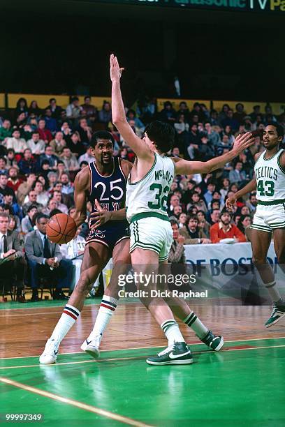 Bill Cartwright of the New York Knicks drives against Kevin McHale of the Boston Celtics during a game played in 1983 at the Boston Garden in Boston,...