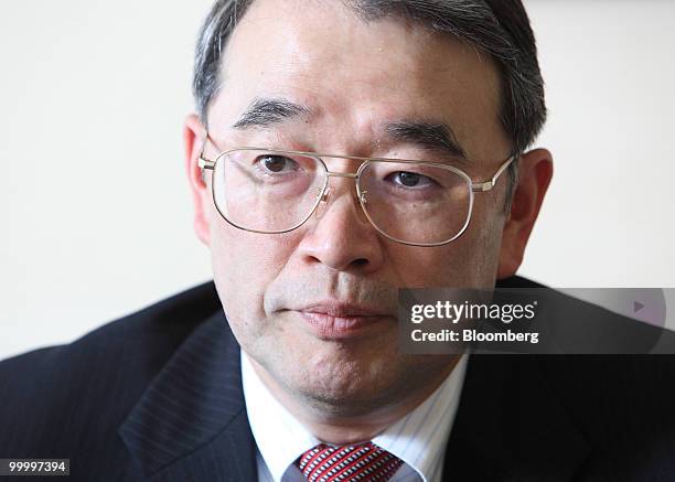 Nobuhiro Endo, president of NEC Corp., listens during an interview in Tokyo, Japan, on Wednesday, May 19, 2010. NEC Corp. Said investments in its...