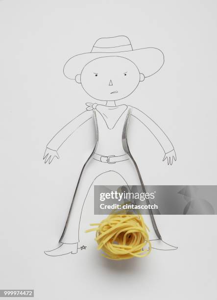 conceptual cowboy standing by tumbleweed - looking down at camera stock illustrations
