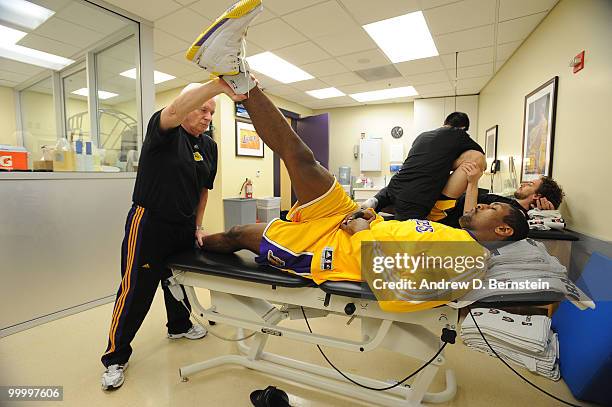 Ron Artest of the Los Angeles Lakers is stretched before taking on the Phoenix Suns in Game Two of the Western Conference Finals during the 2010 NBA...