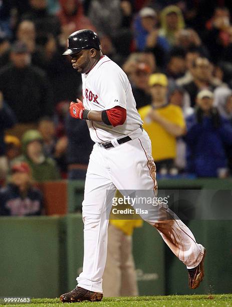 David Ortiz of the Boston Red Sox heads for home after his hit was ruled a home run in the fourth inning against the Minnesota Twins on May 19, 2010...