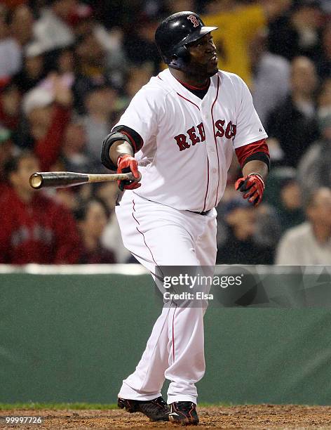 David Ortiz of the Boston Red Sox watches his hit in the fourth inning against the Minnesota Twins on May 19, 2010 at Fenway Park in Boston,...