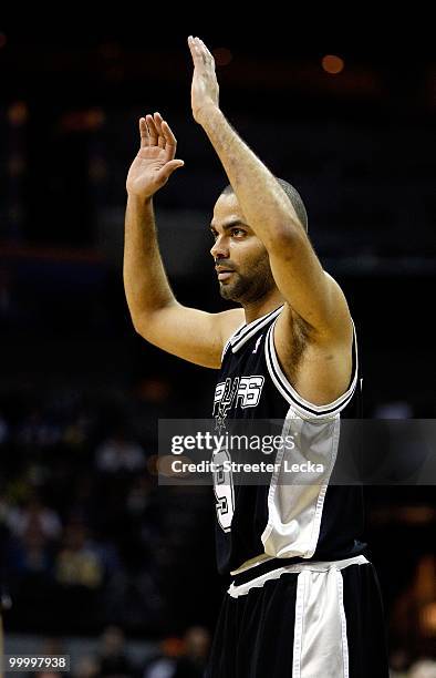 Tony Parker of the San Antonio Spurs reacts during the game against the Charlotte Bobcats on January 15, 2010 at Time Warner Cable Arena in...