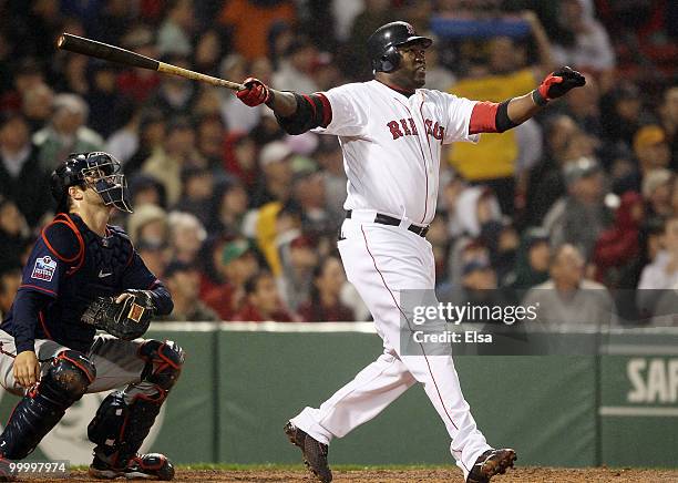 David Ortiz of the Boston Red Sox watches his hit in the fourth inning against the Minnesota Twins on May 19, 2010 at Fenway Park in Boston,...