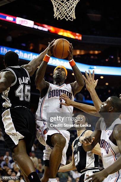 Stephen Jackson of the Charlotte Bobcats goes up for a shot against DeJuan Blair of the San Antonio Spurs during the game on January 15, 2010 at Time...