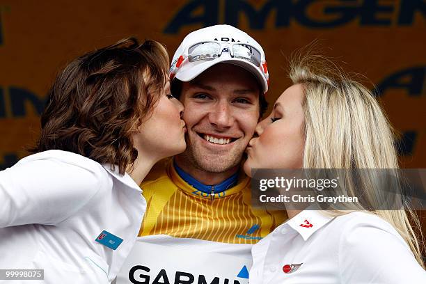 David Zabriskie of Garmin-Transitions celebrates on the podium after keeping the yellow leader's jersey after the fourth stage of the Tour of...