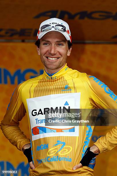 David Zabriskie of Garmin-Transitions celebrates on the podium after keeping the yellow leader's jersey after the fourth stage of the Tour of...