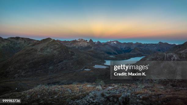 sunset in the swiss alps. - maxim ストックフォトと画像