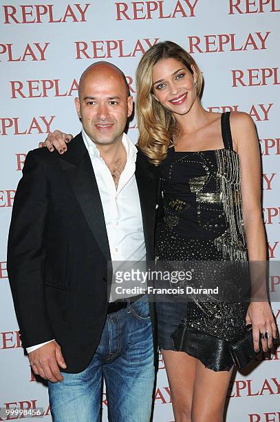 Model Ana Beatriz Barros with Replay's CEO Matteo Sinigaglia arrives at the Replay Party during the 63rd Annual Cannes Film Festival at Style Star...