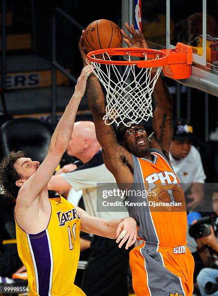 Pau Gasol of the Los Angeles Lakers fouls Amar'e Stoudemire of the Phoenix Suns during the first quarter in Game Two of the Western Conference Finals...