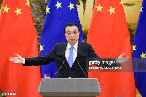 Chinese Premier Li Keqiang speaks during a joint press conference with European Council President Donald Tusk at the Great Hall of the People in...