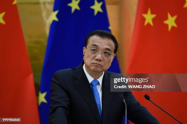 Chinese Premier Li Keqiang attends a press conference at the Great Hall of the People in Beijing on July 16, 2018.