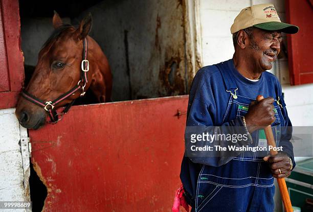 Florzell "Georgie" Daniels, age 80, and other workers in the standardbred horse racing industry at the nearly defunct Rosecroft Raceway Park are...