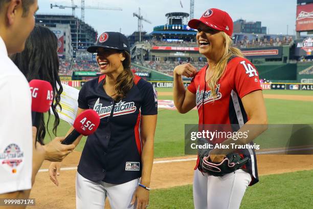 Jessica Mendoza and Jennie Finch are interviewed during the Legends & Celebrity Softball Game at Nationals Park on Sunday, July 15, 2018 in...