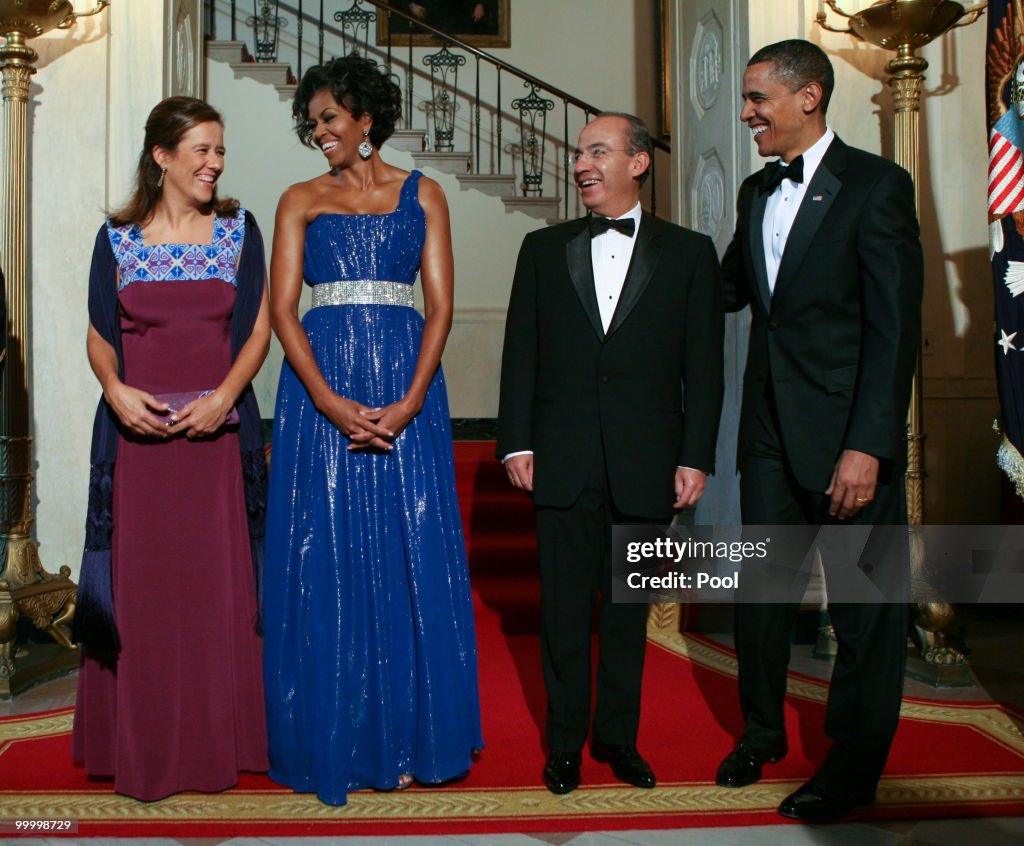 Obamas Greet Mexican Counterparts As They Arrive For State Dinner