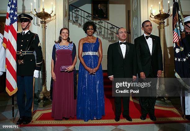 President Barack Obama and first lady Michelle Obama welcome Mexican President Felipe Calderon and his wife Margarita Zavala to the White House for a...
