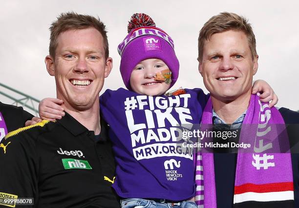 Bone Marrow Failure patient Elliott poses with Jack Riewoldt of the Tigers and his brother and St.Kilda Saints legend Nick Riewoldt during the...