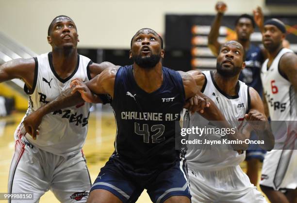 Ivan Asks of Team Challenge ALS boxes out Franklin Robinson and Kyle Gibson of the Citi Team Blazers in the Western Regional of The Basketball...