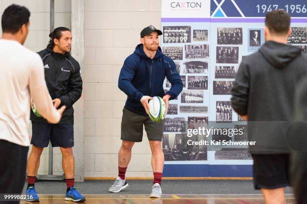Ryan Crotty passes the ball during a Crusaders Super Rugby training session at St Andrew's College on July 16, 2018 in Christchurch, New Zealand.