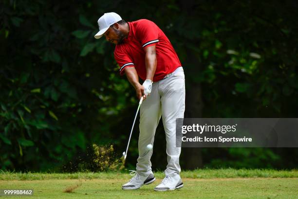 Harold Varner III plays a tee shot on the sixth hole during the final round of the John Deere Classic on July 15, 2018 at the TPC Deere Run in...