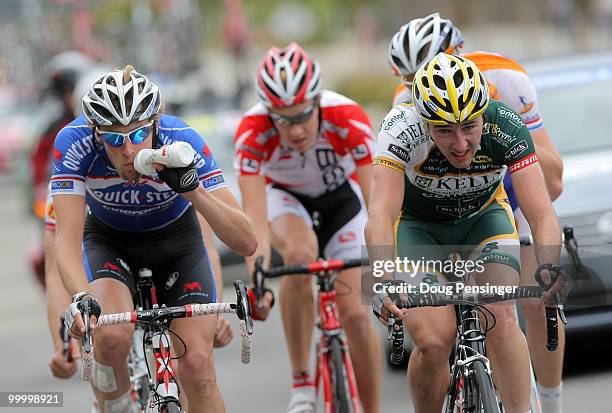 Jurgen Van De Walle of Belgium and riding for Quickstep takes a drink as he and Ryan Anderson of Canada and riding for Kelly Benefits work in the...