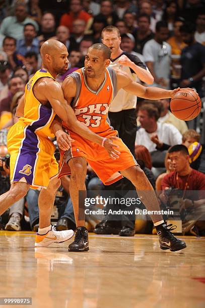 Grant Hill of the Phoenix Suns posts up against Derek Fisher of the Los Angeles Lakers in Game Two of the Western Conference Finals during the 2010...