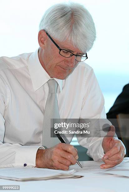Alaster Hall, Deputy Managing Director of the Brisco Group makes notes during the Annual General Meeting on May 20, 2010 in Auckland, New Zealand....