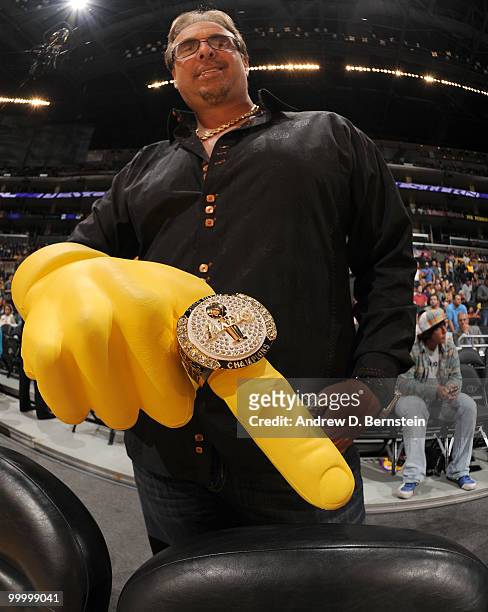 Fan holds up a foam finger before a game between the Phoenix Suns and the Los Angeles Lakers in Game Two of the Western Conference Finals during the...