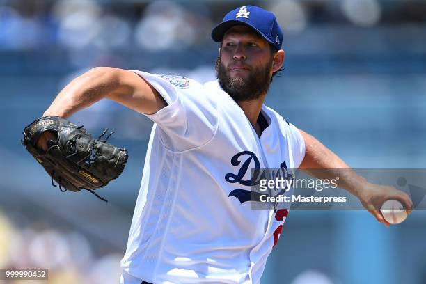 Clayton Kershaw of the Los Angeles Dodgers pitchs during the MLB game against the Los Angeles Angels at Dodger Stadium on July 15, 2018 in Los...