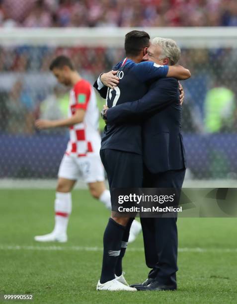 Olivier Giroud and France coach Didier Deschamps celebrates at the final whistle during the 2018 FIFA World Cup Russia Final between France and...