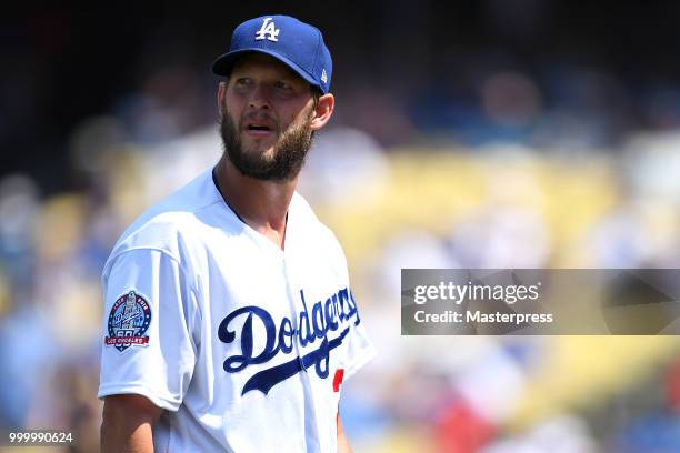 Clayton Kershaw of the Los Angeles Dodgers looks on during the MLB game against the Los Angeles Angels at Dodger Stadium on July 15, 2018 in Los...