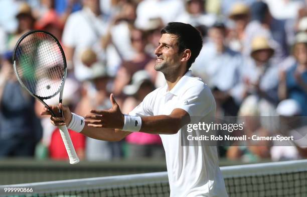 Novak Djokovic celebrates after winning his match against Kevin Anderson in the Final of the Gentlemen's Singles at All England Lawn Tennis and...