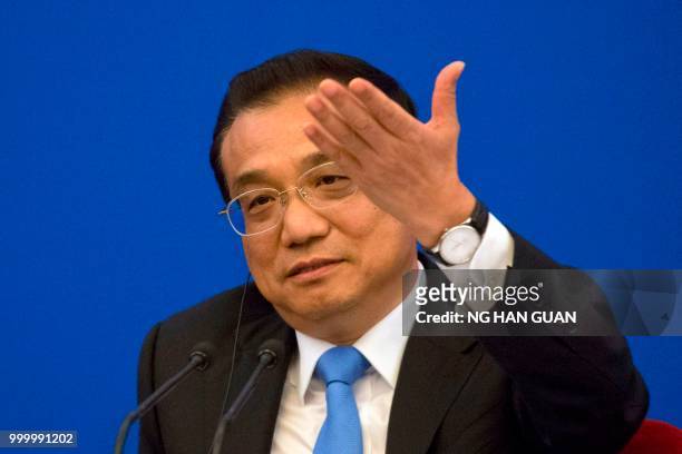 China's Premier Li Keqiang speaks during the China-EU Business Roundtable at the Great Hall of the People in Beijing on July 16, 2018. - The European...