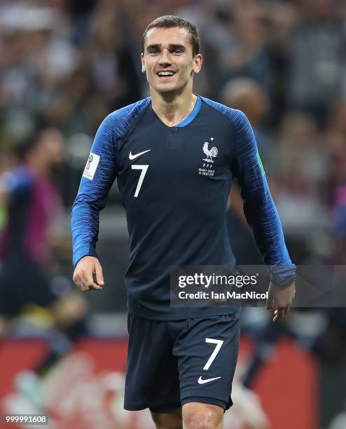 Antoine Griezmann of France celebrates after Paul Pogba of France scores during the 2018 FIFA World Cup Russia Final between France and Croatia at...