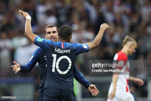 Antoine Griezmann of France celebrates after Paul Pogba of France scores during the 2018 FIFA World Cup Russia Final between France and Croatia at...