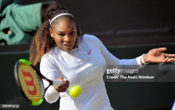 Serena Williams of The United States plays a forehand against Angelique Kerber of Germany in the Ladies' Singles final on day twelve of the Wimbledon...